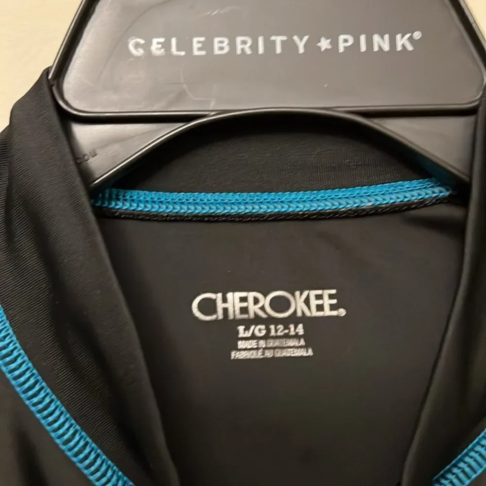 Cherokee youth boys black swim shirt size large(12-14).